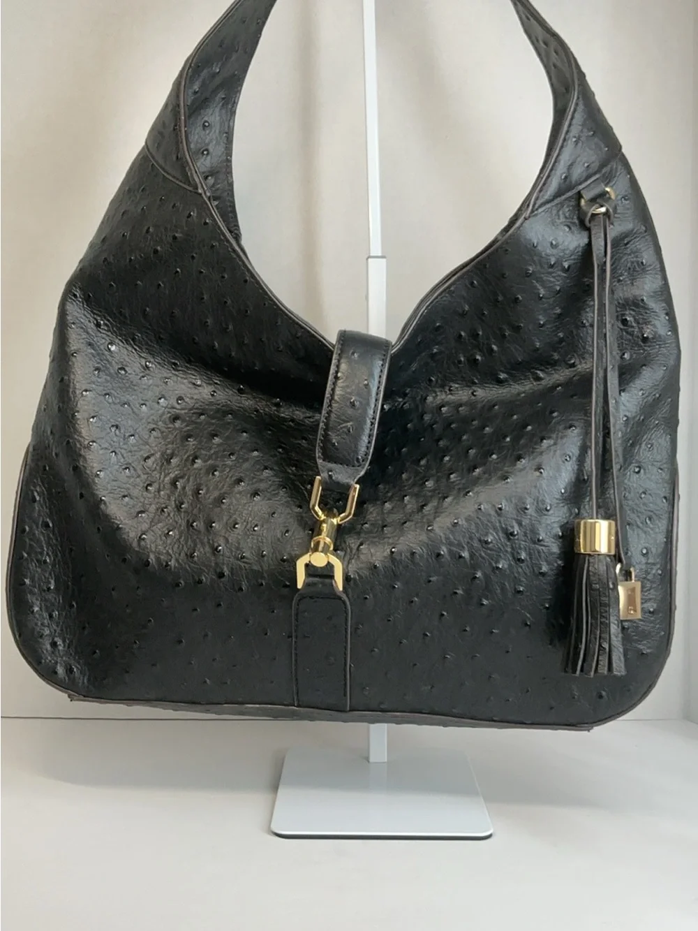 G.I.L.I. Verona black leather ostrich-embossed hobo shoulder bag.